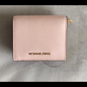 Pink Michael kors wallet.